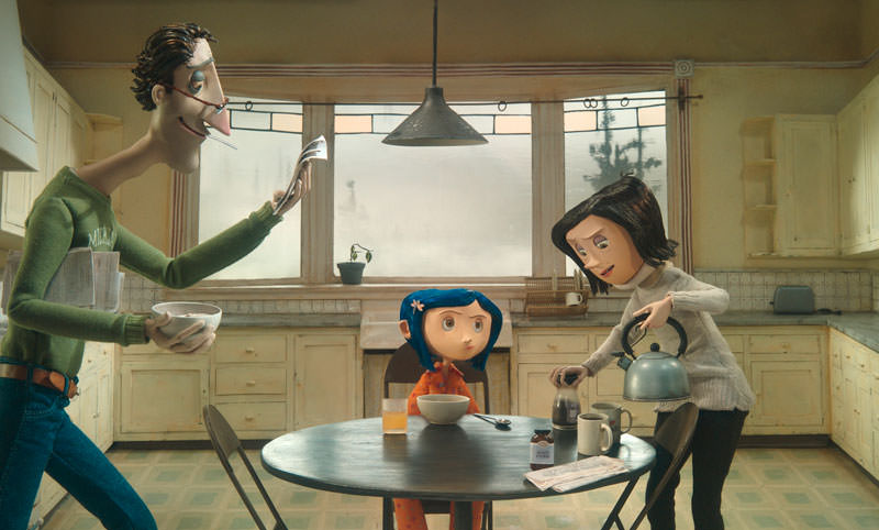 Coraline tries to get the attention of her harried parents