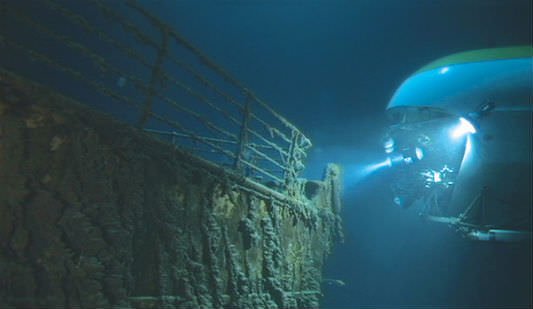 A submersible navigates around the Titanic.