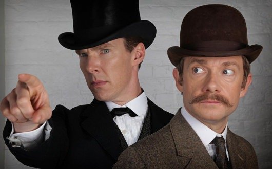 Benedict Cumberbatch and Martin Freeman as Sherlock and Watson