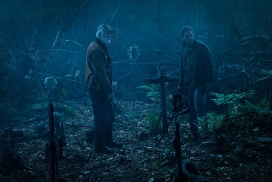 John Lithgow as Jud, left, and Jason Clarke as Louis and in PET SEMATARY, from Paramount Pictures.